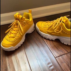 Yellow fila shoes